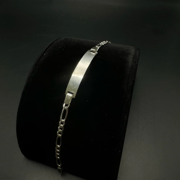 Figaro bracelet silver and gold